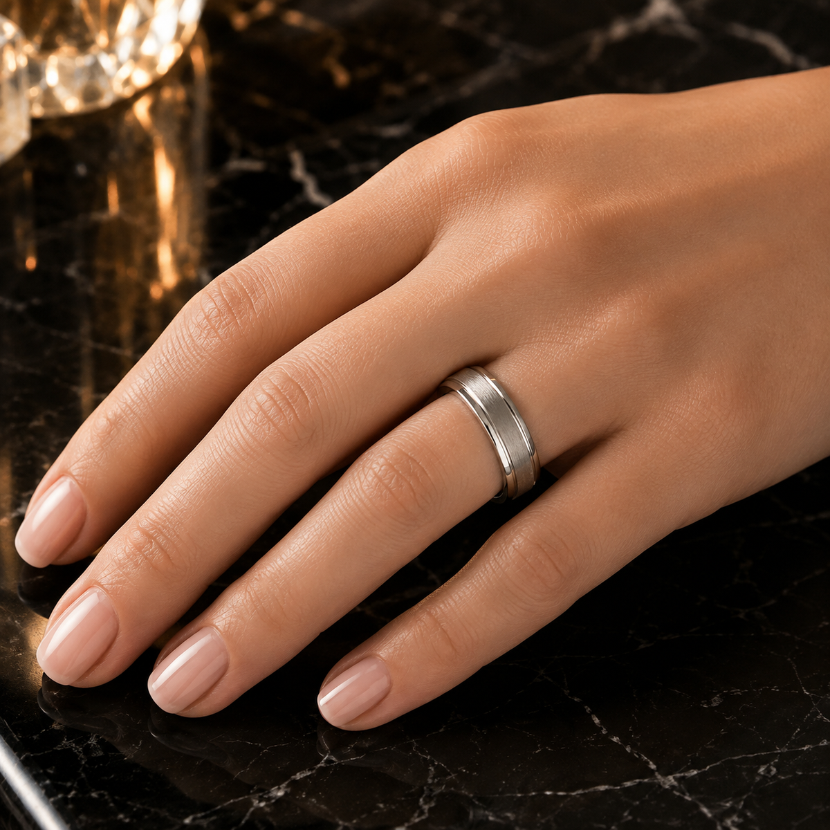 Modern, timeless, and made for everyday wear, this 4mm gray high-polished tungsten wedding band delivers a bold yet refined look. Its sleek mirror-like finish and smooth comfort-fit interior make it an ideal choice for a wedding band, anniversary gift, promise ring, or meaningful everyday piece.

Crafted from durable tungsten, this ring is designed to handle daily life while maintaining its polished appearance. The classic 4mm width offers a strong, balanced profile that pairs effortlessly with any style—from casual to formal.