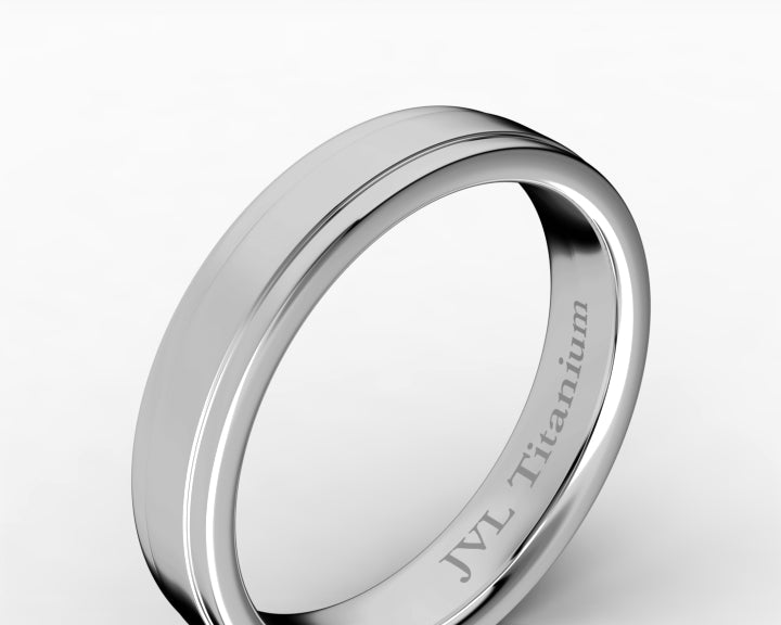 4mm Gray High-Polished Titanium Wedding Band – Comfort Fit
Modern, timeless, and made for everyday wear, this 4mm gray high-polished titanium wedding band delivers a bold yet refined look. Its sleek finish and smooth comfort-fit interior make it an ideal choice for a wedding band, anniversary gift, promise ring, or meaningful everyday piece.

Crafted from durable titanium, this ring is designed to handle daily life while maintaining its polished appearance. The classic 4mm width offers a strong, balanced profile that pairs effortlessly with any style—from casual to formal.