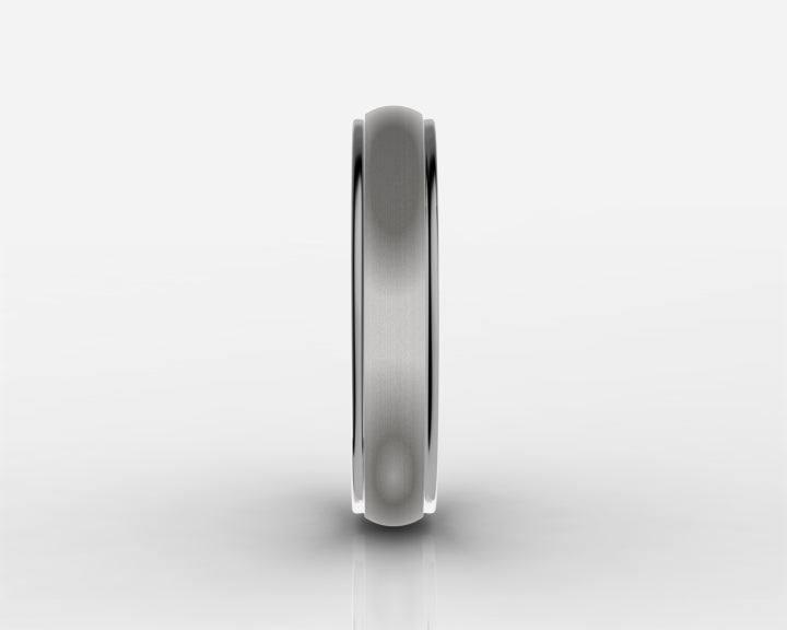 4mm Gray High-Polished Titanium Wedding Band – Comfort Fit
Modern, timeless, and made for everyday wear, this 4mm gray high-polished titanium wedding band delivers a bold yet refined look. Its sleek finish and smooth comfort-fit interior make it an ideal choice for a wedding band, anniversary gift, promise ring, or meaningful everyday piece.

Crafted from durable titanium, this ring is designed to handle daily life while maintaining its polished appearance. The classic 4mm width offers a strong, balanced profile that pairs effortlessly with any style—from casual to formal.